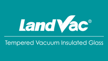What are the environmental benefits of using LandVac vacuum glazing?